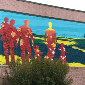 Apex Mural Silhouette of family in red and yellow