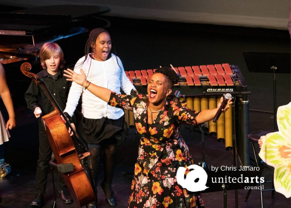 Teaching Artist Shana Tucker performing “Give Bees a Chance” with students from Powell Elementary* Raleigh, February 19, 2020